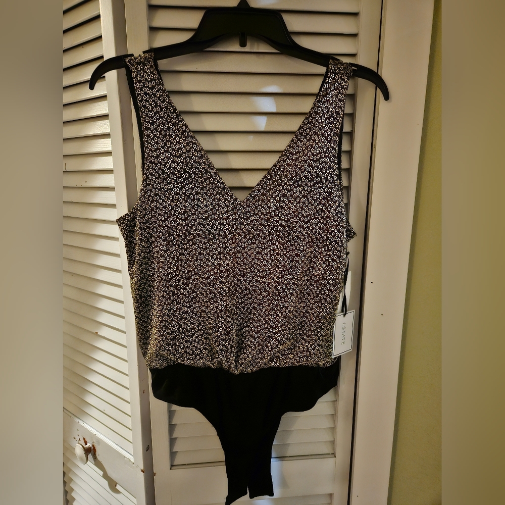Brand new sleeveless deep v bodysuit top
